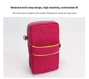 Detail of rose red nylon phone arm bag showing wide elastic wristband and D-ring hook