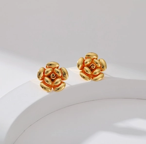 Minimalist 18K gold-plated brass stud earrings featuring creative five-petal flower design