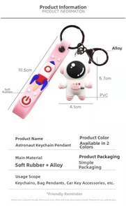 Spécifications de taille pour le porte-clés astronaute blanc avec sa sangle rose