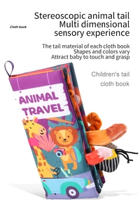Close-up of baby cloth book with textured 3D animal tails for sensory stimulation