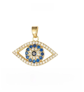 Macro detail of golden evil eye pendant with blue crystals and white zircon stones