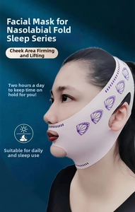 Close-up of pink V-line lifting face mask showing high-elasticity breathable fabric details