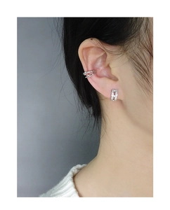 Detailed view of silver S925 double-layer ear cuff and H-shaped diamond stud on ear