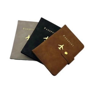 Three-color PU leather RFID passport covers in grey, black, and brown with gold logo