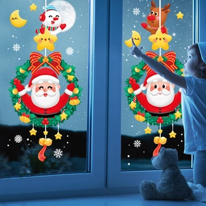 Christmas window static stickers featuring Santa, snowmen, and reindeer in a snowy night