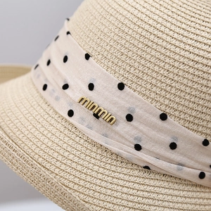 French style straw sun hat with polka dot ribbon and gold metal detail for summer