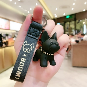 Cute black French Bulldog keychain with gold-studded collar and embossed leather wrist strap