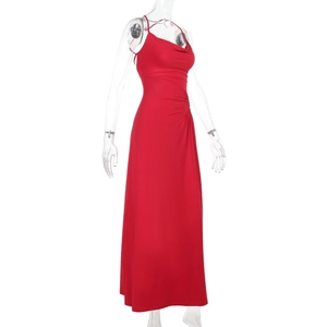 Detail of red backless bodycon maxi dress with ruched side and thin spaghetti straps