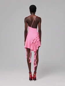 Back view of a pink asymmetric backless dress with ruffled hem and thin shoulder straps