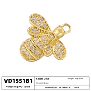Detailed view of 17mm gold brass bee charm with white zircon inlay for DIY jewelry