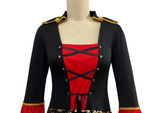 Close-up of gothic pirate costume featuring gold buttons and red lace-up details