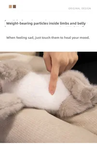 Detail of weighted particles inside plush Persian cat doll for realistic feel