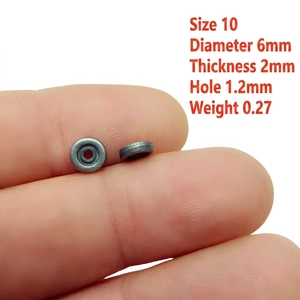 Detail view of 6mm metallic spacer beads showing dimensions 6x2mm for jewelry making