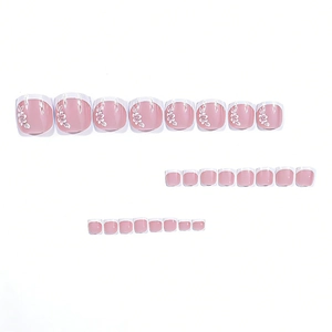 Short square press-on toenails with classic pink French tips and white flower patterns