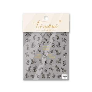 Macro view of retro flower nail stickers in dark gray with fine metallic petal details