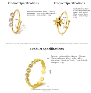 Detailed view of three gold-plated stainless steel star and floral rings with weights