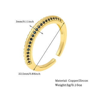 Detailed view of gold plated copper ring with blue zircon stones and size specifications