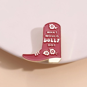 Red enamel cowboy boot brooch with What Would Dolly Do lettering and floral design