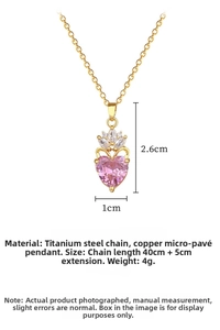 Detail of pink heart pendant with crown design and precise dimensions of 2.6cm by 1cm