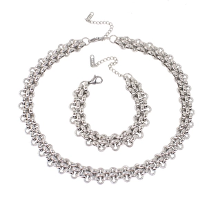 Detail view of heavy silver titanium steel chain necklace and bracelet jewelry set