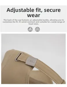 Detail view of khaki baseball cap with adjustable metal buckle for customized fit