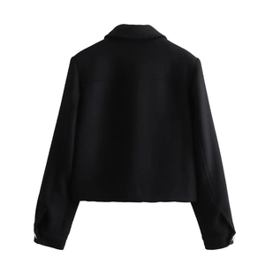 Back view of a classic black short jacket for women featuring structured fabric seams