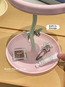 Macro detail of tulip flower mirror base storage tray for jewelry and makeup desktop organizer