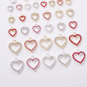 Hollow heart nail charms and alloy jewelry pendants with rhinestones in various colors