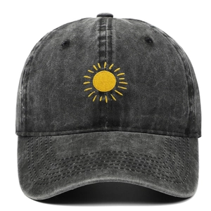 Close-up of vintage washed charcoal cotton baseball cap with yellow sun embroidery detail