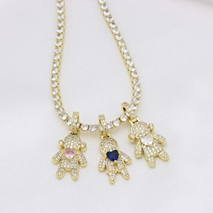Gold tennis chain with three teddy bear pendants featuring pink and blue heart zircons