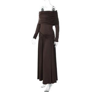 Detail of coffee brown off-shoulder dress with elegant pleated bodice and flared skirt