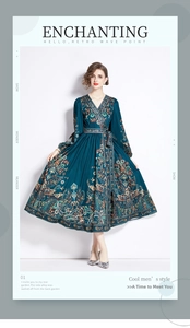 Detailed view of V-neckline and intricate paisley print on long-sleeved midi dress