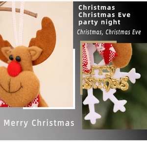 Detail of Christmas reindeer felt ornament and snowflake pendant with gold lettering