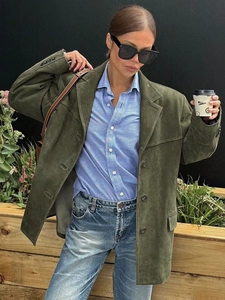 Street style view of military green suede blazer with oversized lapels and side pockets