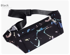 Close-up of black sports waist bag featuring colorful paint splatter and dual zippers