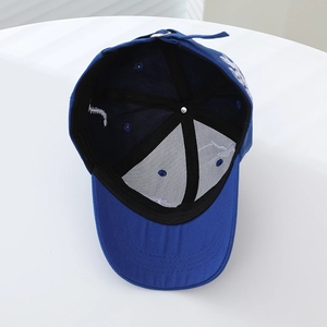 Deep blue dinosaur baseball cap interior view with sweatband and metal adjustment buckle