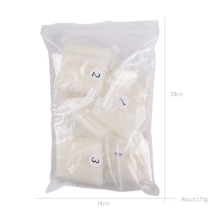 Bulk XXL C-curve white semi-clear nail tips in multi-pack with size labels