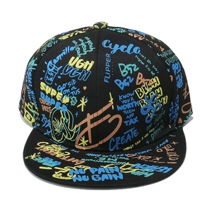 Detail of colorful graffiti art and NO PAIN NO GAIN slogan on black snapback cap