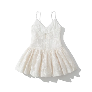 Short white V-neck mini dress with textured floral jacquard fabric and thin straps