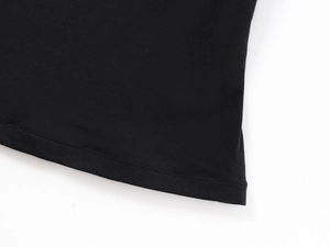 Close-up of the professional flat-stitched hem on this black slimming athletic t-shirt