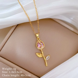 Detail of tulip pendant with pink gemstone and zircon showing 4g weight and 1.4x3.5cm size