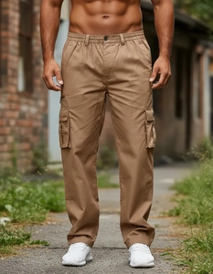 Detail of khaki cargo pants featuring large side pockets and durable cotton twill fabric