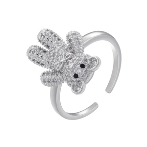 Detailed macro view of a silver teddy bear ring featuring micro-paved sparkling crystals