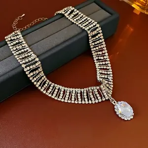 Luxury choker necklace with oval zircon pendant and gold plated multi-row crystal band