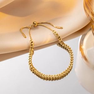 Elegant 18K gold-plated titanium steel wheat chain bracelet with adjustable bolo clasp