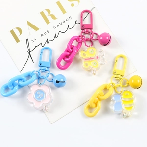 Colorful cartoon animal keychains with plastic chains and bells for bag decoration