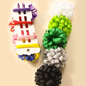 Colorful handmade grosgrain ribbon curly bow hair ties set on display card