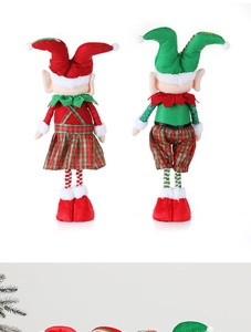 Rear view of festive Christmas elf dolls in red and green plaid outfits on white background