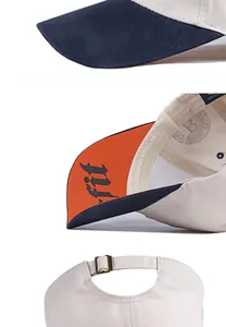 Detail of adjustable metal buckle and contrast stitching on cotton baseball cap