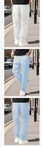 Detail of lightweight quick-dry men's cargo pants with drawstring waist and cargo pockets